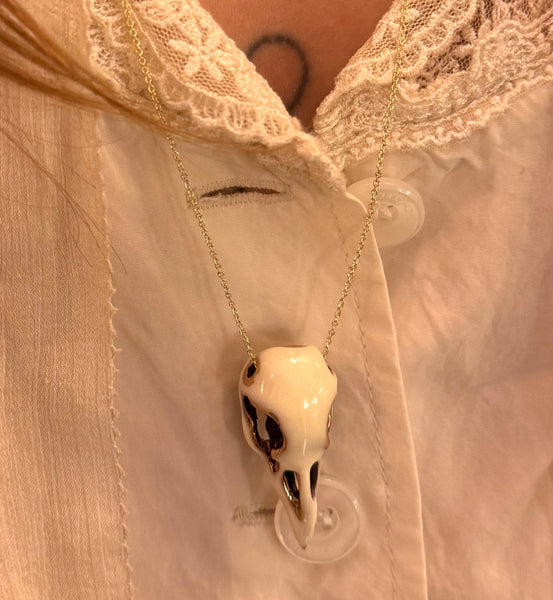 'Bird skull' white necklace | Bronze