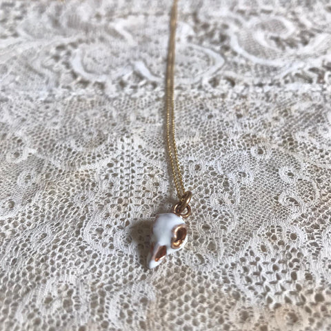 'bird skull' white necklace | bronze