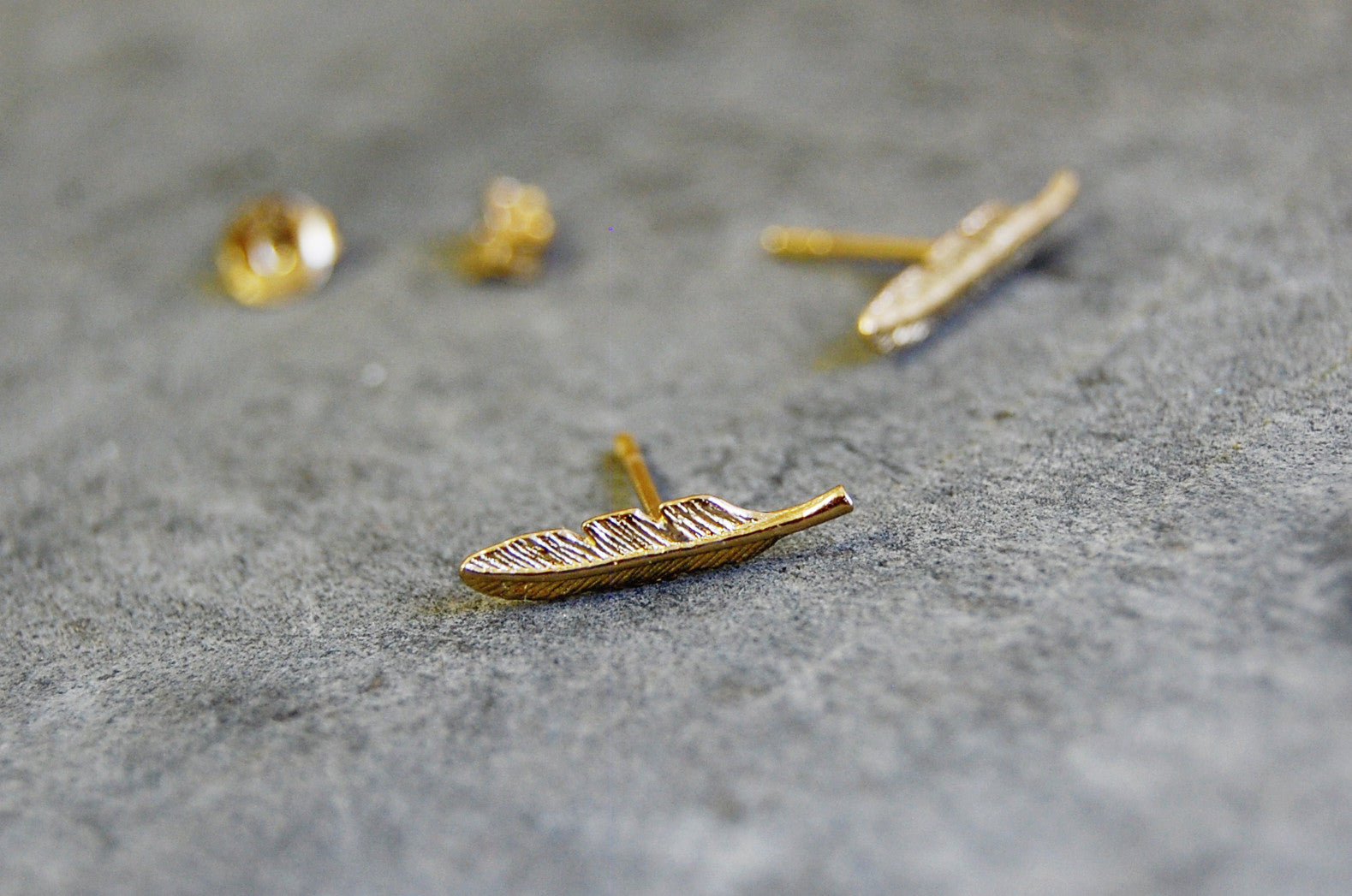 feather earstuds | 24k gold-plated