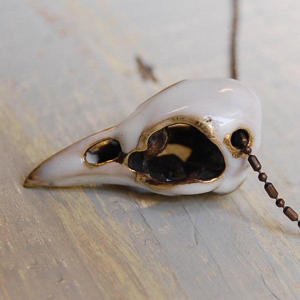 'Bird skull' white necklace | Bronze