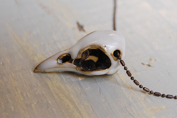 'Bird skull' white necklace | Bronze